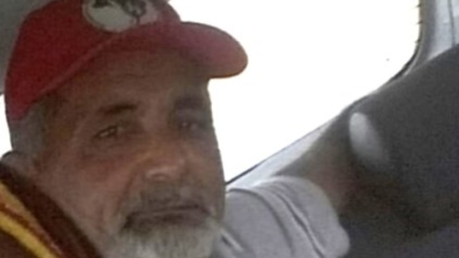 Retrato de Homem com Boné Vermelho e Barba