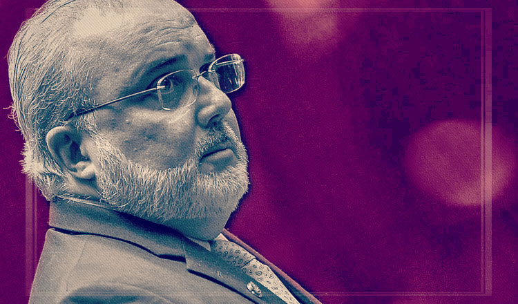 Perfil de homem barbudo e óculos, olhar atento