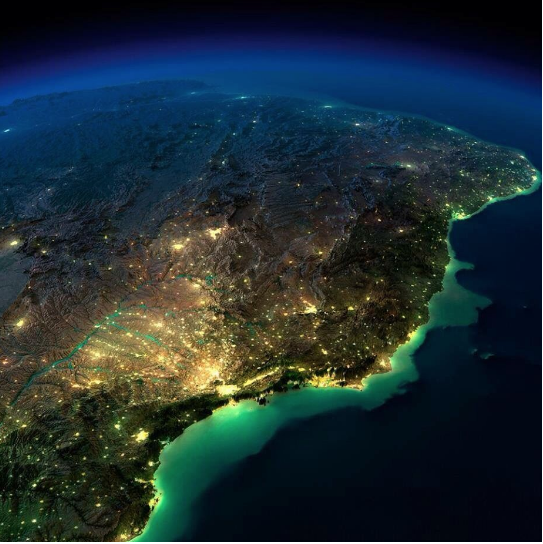 Visão Noturna da Terra: Urbanização e Luzes Costeiras