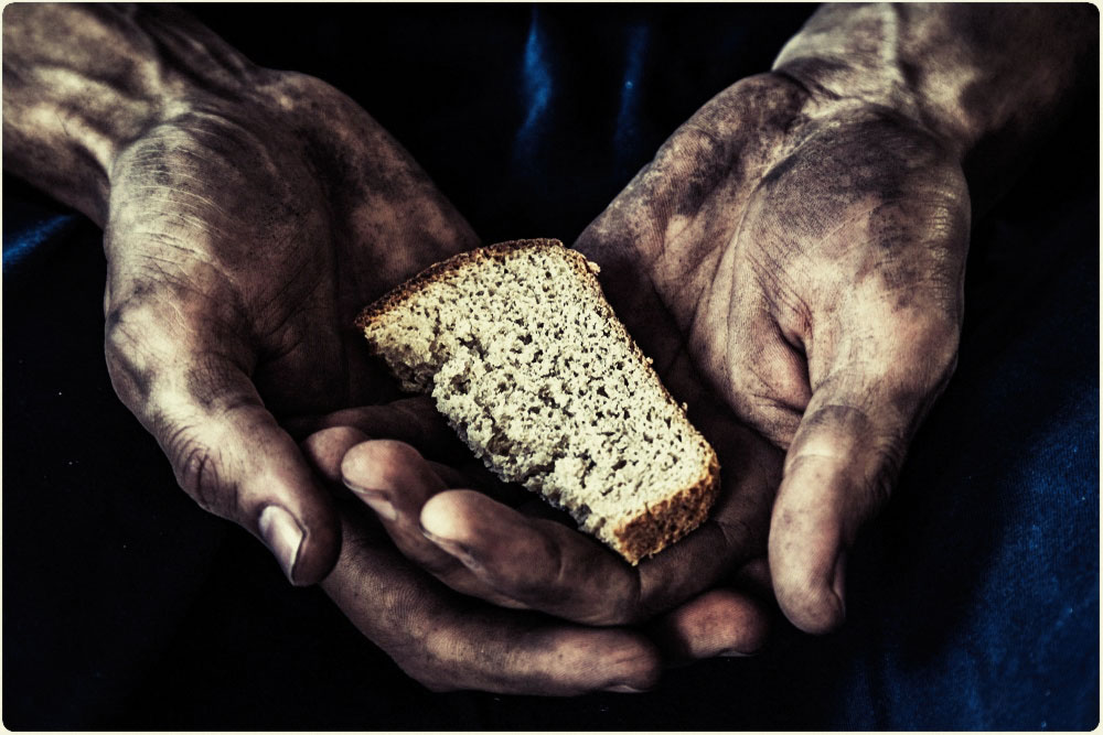 Mãos Calejadas e um Pedaço de Pão
