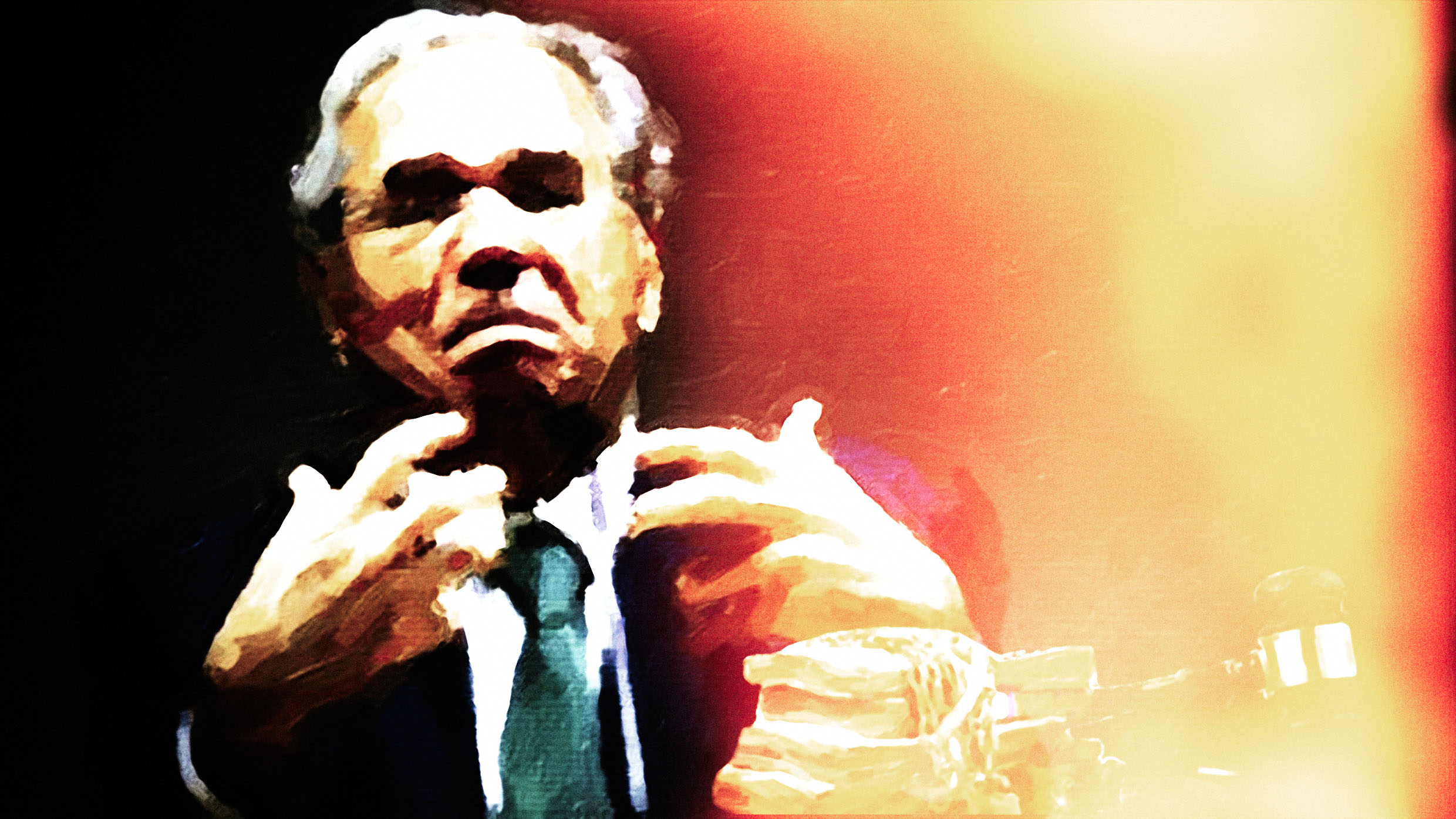 Orador Gesticulando Sob Luz Dramática