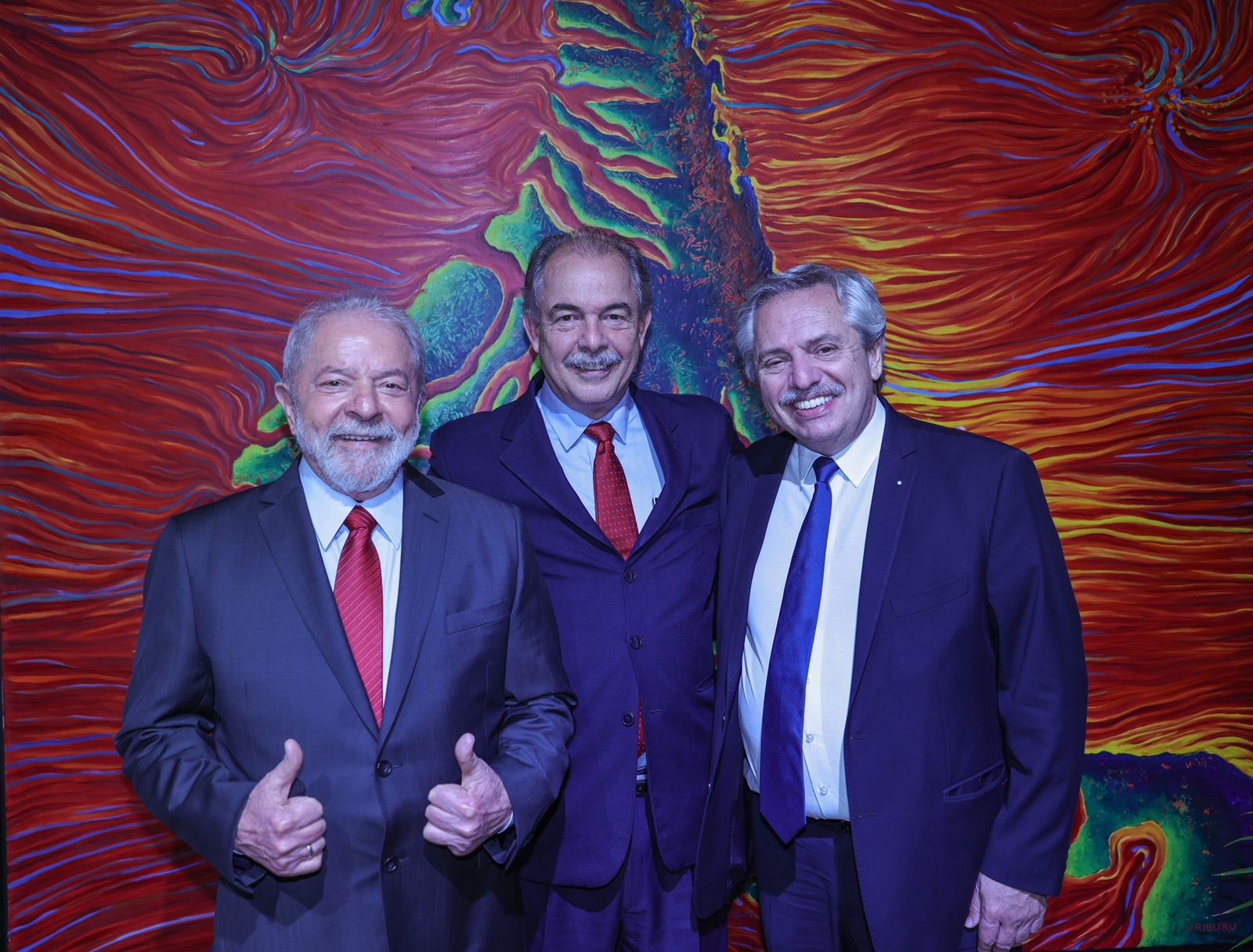 Lula, Fernández e acompanhante em encontro político