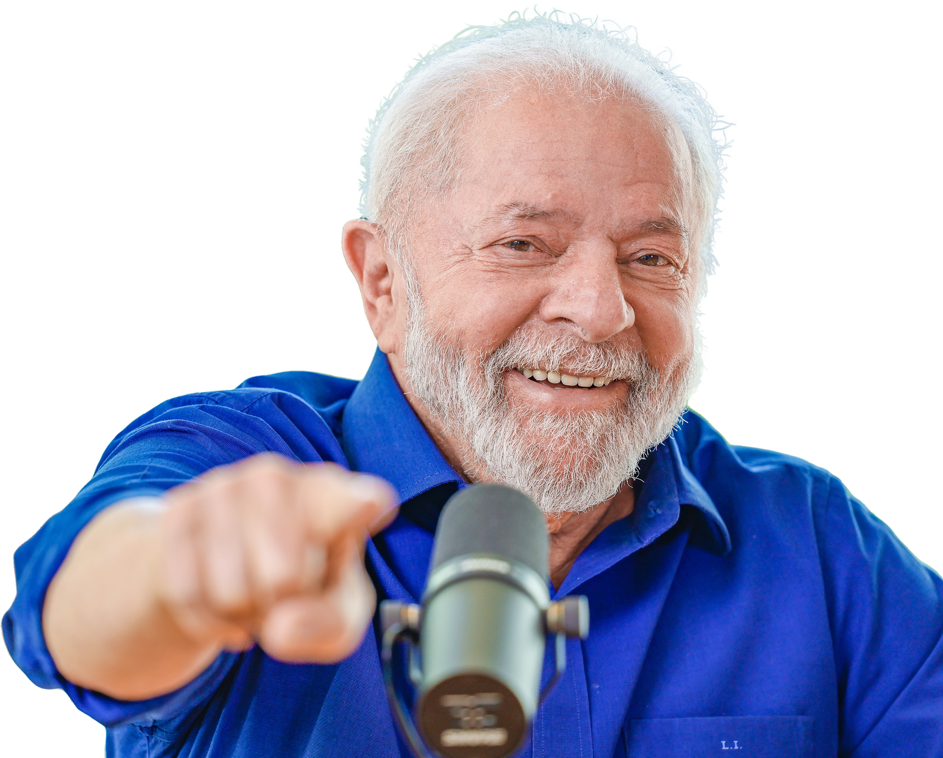 Lula sorrindo e apontando em comunicação direta